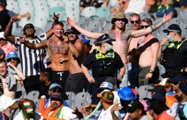 Fans chant at the Melbourne Cricket Ground last month. A spectator who was at the showpiece Boxing Day Australia-India Test has tested positive for coronavirus and fans seated nearby have been urged to get Covid tested and isolate. PHOTO: YAHOO SPORTS