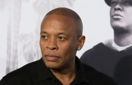 (FILES) In this file photo taken on August 10, 2015 rapper/producer Dr. Dre arrives for the Universal Pictures And Legendary Pictures premiere of "Straight Outta Compton" in Los Angeles. - Rapper and legendary producer Dr. Dre was in the hospital on January 5, 2021 receiving treatment for a possible brain aneurysm, the Los Angeles Times reported citing sources familiar with his condition. (Photo by Valerie MACON / AFP)
