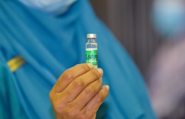 Shot of an Oxford-AstraZeneca vaccine vial from the COVID-19 vaccination kick-off event in Maldives. PHOTO: AHMED ASHWAN ILYAS / MIHAARU