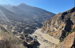 This general view shows state-run NTPC hydropower project site damaged after a broken glacier caused a major river surge that swept away bridges and roads, near Joshimath in Chamoli district of Uttarakhand, on February 7, 2021. - At least 200 people are missing in northern India after a piece of Himalayan glacier fell into a river, causing a torrent that buried two power plants and swept away roads and bridges, police said on February 7. (Photo by Ajay BHATT / AFP)