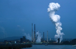 White smoke rises from the blast furnace Schwelgern at the plant of the German industrial conglomerate ThyssenKrupp in Duisburg, western Germany, on February 4, 2021. ThyssenKrupp will broadcast the annual general meeting live via internet streaming with presentations by CEO Martina Merz on February 5, 2021.
Ina FASSBENDER / AFP