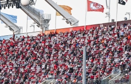 Fans sit socially distanced at the Super Bowl match between Kansas City Chiefs and Tampa Bay Buccaneers in Tampa, Florida on February 7, 2021. (Photo by CHANDAN KHANNA / AFP)