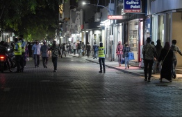 A police officers on the streets of Male' during vehicle ban hours. PHOTO: NISHAN ALI / MIHAARU