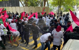 Protesters clashing against police officers in the demonstration held on February 12. PHOTO: MIHAARU