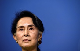 (FILES) In this file photo taken on June 12, 2017 Myanmar's State Counsellor Aung San Suu Kyi attends a press conference at the Rosenbad government office in Stockholm. - Myanmar's military regime has hit deposed leader Aung San Suu Kyi with a second charge, this time under the country's natural disaster management law, her lawyer said February 16, 2021. (Photo by Jonathan NACKSTRAND / AFP)