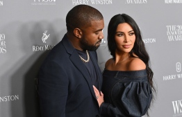 (FILES) In this file photo US media personality Kim Kardashian West (R) and husband US rapper Kanye West attend the WSJ Magazine 2019 Innovator Awards at MOMA on November 6, 2019 in New York City. - Reality TV star Kim Kardashian has filed for divorce from rapper Kanye West after almost seven years of marriage, US media reported February 19. 

Kardashian's lawyer Laura Wasser filed papers confirming a split first rumored back in January, when the mega-celebrity couple were reported to be living separately, Fox News said. (Photo by Angela Weiss / AFP)