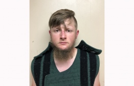 This handout booking photo released by the Crisp County Sheriff's Office on March 16, 2021 shows 21-year-old shooting suspect Robert Aaron Long. - Eight people were killed in shootings at three different spas in the US state of Georgia on March 16 and a 21-year-old male suspect was in custody, police and local media reported, though it was unclear if the attacks were related. (Photo by - / Crisp County Sheriff's Office / AFP) /