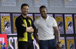 (FILES) In this file photo taken on July 20, 2019 US-Romanian actor Sebastian Stan (L) and US actor Anthony Mackie speak on stage during the Marvel panel in Hall H of the Convention Center during Comic Con in San Diego, California. - Marvel Studios chief Kevin Feige is adamant that fans of his studio's explosive superhero antics will not miss out during the pandemic-accelerated shift to the small screen. "The Falcon and the Winter Soldier" is in fact the second Marvel show to hit Disney+.
It follows the oddball and quirky yet critically adored "WandaVision," whose place within the franchise's overarching story was cryptic to say the least. (Photo by Chris Delmas / AFP)