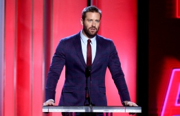 (FILES) In this file photo Armie Hammer speaks onstage during the 2019 Film Independent Spirit Awards on February 23, 2019 in Santa Monica, California. - Los Angeles police said March 18, 2021, they had opened an investigation into rape allegations made against US actor Armie Hammer after a former partner filed a complaint. The 24-year-old woman detailed her accusations Thursday morning during a virtual press conference with her lawyer, women's rights attorney Gloria Allred. (Photo by Tommaso Boddi / GETTY IMAGES NORTH AMERICA / AFP)