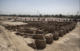 A picture taken on April 10, 2021, shows a view of a 3000 year old city, dubbed The Rise of Aten, dating to the reign of Amenhotep III, uncovered by the Egyptian mission near Luxor. - Archaeologists have uncovered the remains of an ancient city in the desert outside Luxor that they say is the "largest" ever found in Egypt and dates back to a golden age of the pharaohs 3,000 years ago. Famed Egyptologist Zahi Hawass announced the discovery of the "lost golden city", saying the site was uncovered near Luxor, home of the legendary Valley of the Kings. (Photo by Khaled DESOUKI / AFP)