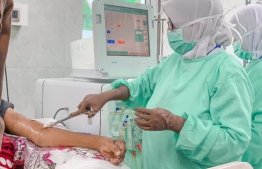 A patient receiving dialysis treatments at the Addu Equatorial Hospital.