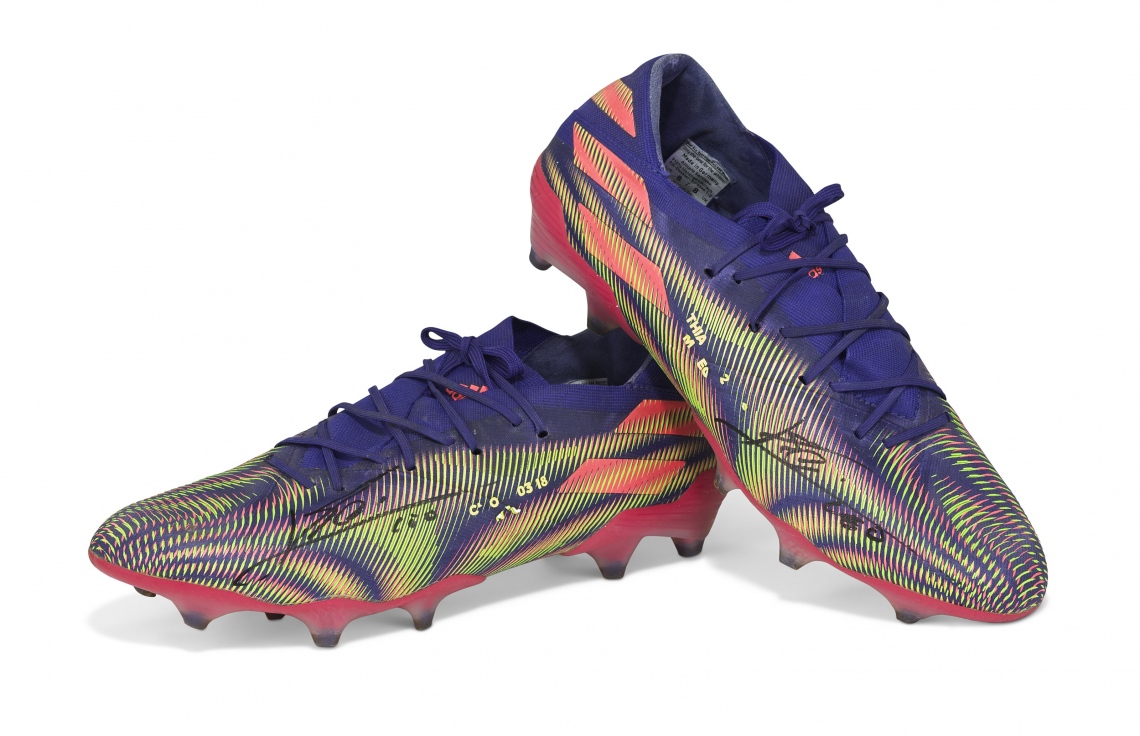 މެސީ އެންމެ ގިނަ ގޯލު ޖެހި ބޫޓް 100،000 ޑޮލަރަށް