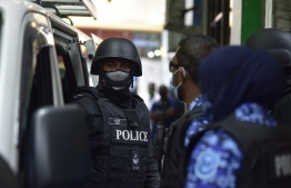 Police taking a suspect under custody during a special operation. MIHAARU FILE PHOTO/NISHAN ALI