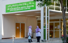 Nurses employed at Hulhumale Hospital (HMH) standing in front of the Dr. N. D. Abdulla Abdul Hakeem Ophthalmology Centre located in Phase 1 of Hulhumale' City.