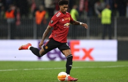 Manchester United's English striker Marcus Rashford scores from the penalty during the UEFA Europa League final football match between Villarreal CF and Manchester United at the Gdansk Stadium in Gdansk on May 26, 2021. (Photo by MAJA HITIJ / POOL / AFP)