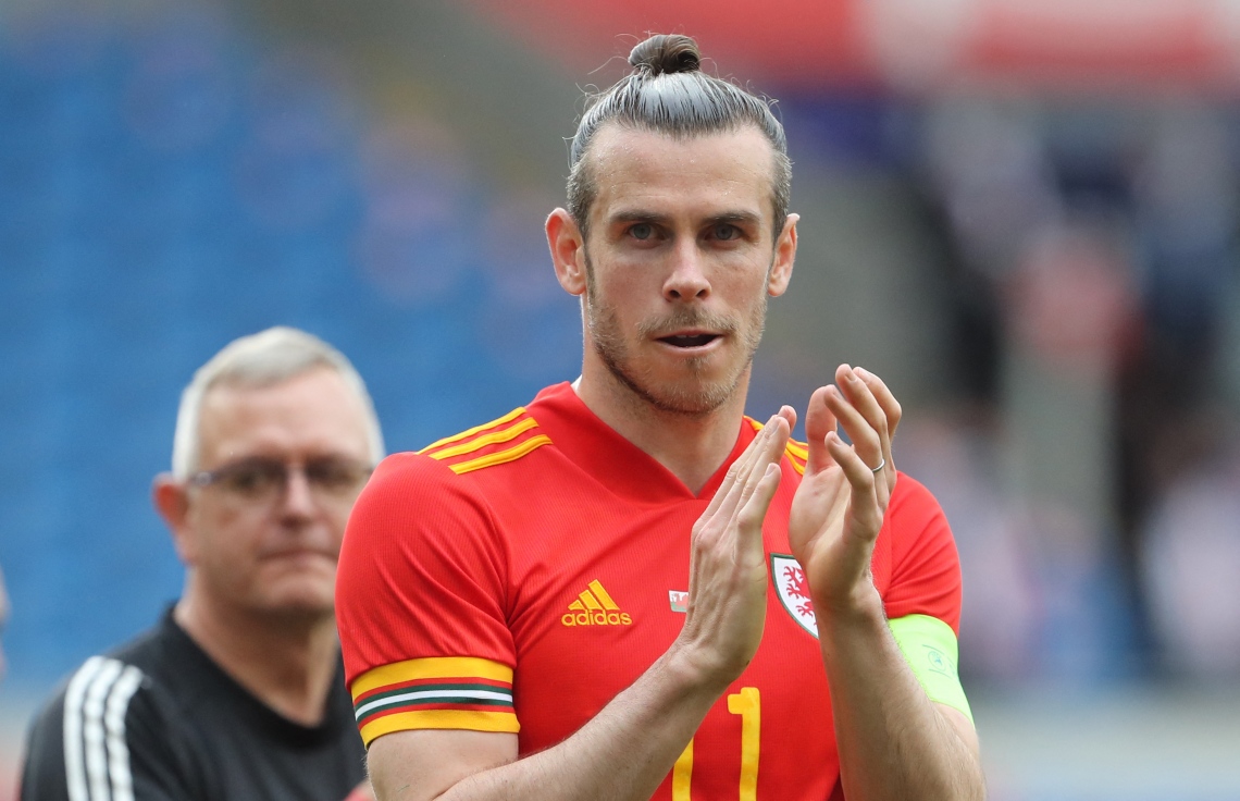 ވޭލްސް، ޖޫން 5، 2021: ޔޫރޯ 2020 އަށް ތައްޔާރުވުމުގެ ގޮތުން އަލްބޭނިއާއާ ދެކޮޅަށް ކުޅުނު އެކުވެރިކަމުގެ މެޗުގައި ވޭލްސްގެ މިޑްފީލްޑަރު ގެރެތު ބޭލް. --ފޮޓޯ:އޭއެފްޕީ