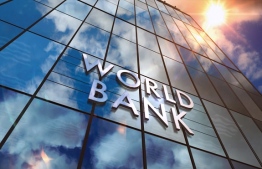 World Bank on glass building. Mirrored sky and city modern facade. Global capital, business, finance, economy, banking and money concept 3D rendering illustration.