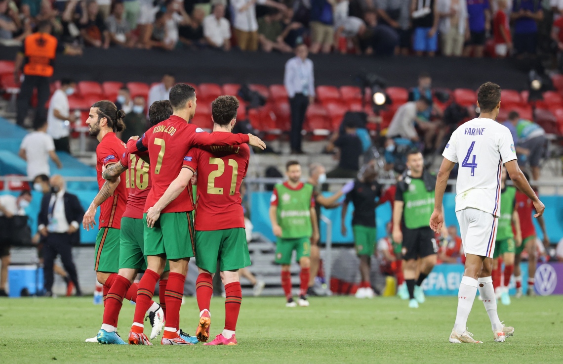 ބުޑަޕެސްޓް: ޖޫން 24، 2021: ޔޫރޯ 2020ގެ ގްރޫޕް އީގެ ފްރާންސް އާއި ޕޯޗުގަލް ބައްދަލުކުރި މެޗުގެ ތެރެއިން: ފްރާންސްގެ މައްޗަށް 2-2 ގެ ނަތީޖާ އަކުން އެއްވަރުކޮށް ޕޯޗްގަލް ވަނީ ދެވަނަ ބުރަށް ދަތުރު ކޮށްފައި.-- ފޮޓޯ: އޭއެފްޕީ