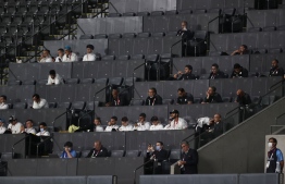 (FILE) Athletes, team members and Olympics officials watch the Tokyo 2020 Olympic Games men's group C first round football match between Argentina and Australia at the Sapporo Dome in Sapporo on July 22, 2021: Beijing Olympics will be held in 2022 without spectators from other nations as a precaution to avoid the spread of COVID-19 -- Photo: Asano Ikko/ AFP