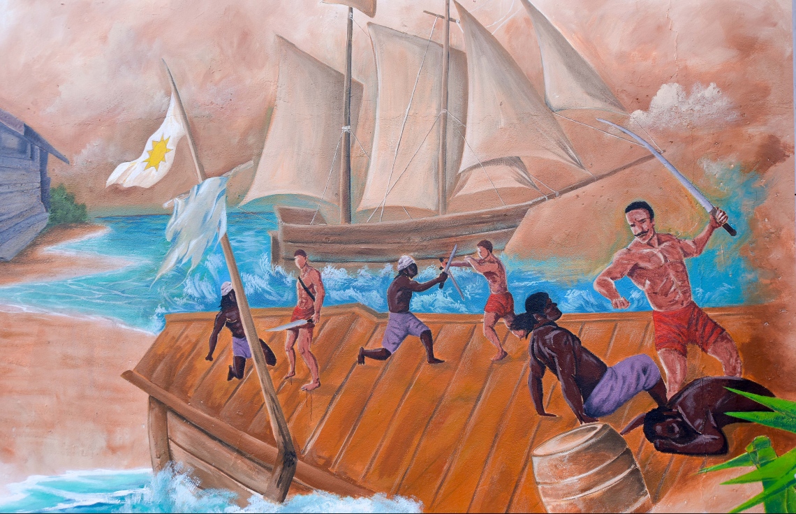 މާލެ- ޖުލައި 27، 2021: ރާއްޖޭގެ 56 ވަނަ މިނިވަން ދުވަހުގެ މުނާސަބަތުގައި، ހޯމް މިނިސްޓްރީން އިންތިޒާމްކޮށްގެން، ދިވެހިން މިނިވަންކަމަށް ކުރި ދަތުރު ދައްކުވައިދޭ ދިވެހި އާޓިސްޓުންގެ ކުރެހުންތައް ސްޓެލްކޯ ފާރުގައި ކުރަހާފައި. --ފޮޓޯ: ނިޝާން އަލީ/ މިހާރު