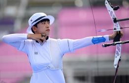 South Korea's An San competes in the women's individual during the Tokyo 2020 Olympic Games at Yumenoshima Park Archery Field in Tokyo on July 30, 2021 -- Photo: Adek Berry/ AFP