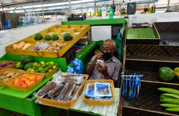 (FILE) Photo taken on August 21, 2021, shows a man working in the market: the board has been discussing six proposals at the moment -- Photo: Ahmed Awshan Ilyas/ Mihaaru