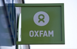 (FILES) In this file photo taken on February 17, 2018 'Oxfam' signage is pictured outside a high street branch of an Oxfam charity shop in south London. - Nicaragua cancelled six US and European NGO's permits, including Oxfam's, on August 16, 2021, days after the government of Daniel Ortega was sanctioned for the detention of some 30 opponents -- Photo: Justin TALLIS / AFP)