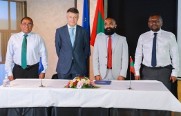 From left to right: Tourism Minister Dr. Abdulla Maussom, EU Ambassador to Maldives Dennis Chaibi, Managing Director of MFMC Hassan Manik, and Economic Minister Fayyaz Ismail standing for a photo after the agreement was signed to provide Maldives with grant aid -- Photo: Economic Ministry