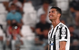(FILES) This file photo taken on August 14, 2021 shows Juventus' Portuguese forward Cristiano Ronaldo reacting during the friendly football match Juventus vs Atalanta at the Allianz Stadium in Turin on August 14, 2021. - To this day, Portuguese forward Cristiano Ronaldo is still playing for Juventus in the Serie A 2021-2022 championship -- Photo: Marco Bertorello/ AFP