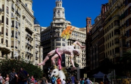 A falla is pictured during the Fallas festival in Valencia on September 2, 2021. - In Valencia, yesterday's deluge of water disturbed the organization of the Fallas, the major festival in the region featuring parades of floats and giant cardboard sculptures, postponed from March to September due to the pandemic. (Photo by JOSE JORDAN / AFP)