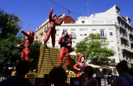 A falla inspired in the Spanish Netflix hit series La Casa de Papel (Money Heist) is pictured during the Fallas festival in Valencia on September 2, 2021. -- Photo: Jose Jordan/ AFP