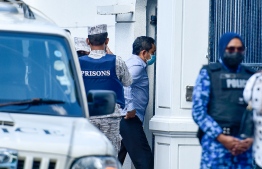 (FILE) Former President Abdulla Yameen being escorted to Supreme Court on September 12, 2021: Supreme Court said as the laws in Maldives does not allow for convicted criminals to be released under bail, they will not issue such an order -- Photo: Ahmed Awshan Ilyas/ Mihaaru