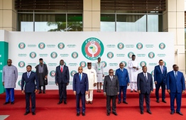 (1st row from L to R): Togo President Faure Gnassingbé, Ivory Coast President Alassane Ouattara, Ghana Nana Addo Dankwa Akufo-Addo, and Togo President Faure Gnassingbé, (2nd row from 2nd L to R): Liberia President George Weah, Sierra Leone President Julius Maada Bio, Guinea Bissau President Umaro Sissoco Embalo, Niger President Mohamed Bazoum, Gambia President Adama Barrow (3rd row L) and Nigeria Vice President Yemi Osinbajo (3rd row R) pose for a family photograph in Accra, Ghana on September 16, 202, during the Economic Community of West African States (ECOWAS) Extraordinary meeting on the political situation in Guinea. -- Photo: Nipah Dennis / AFP
