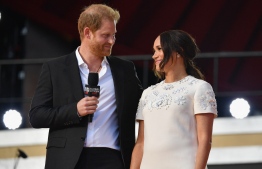 (FILE) Britain's Prince Harry and Meghan Markle speak during the 2021 Global Citizen Live festival at the Great Lawn, Central Park on September 25, 2021 in New York City: Associated Papers appealed in High Court over a ruling made by the lower court regarding  breaching the Meghan Markle's privacy by publishing a letter she wrote to her estranged father -- Photo: Angela Weiss / AFP