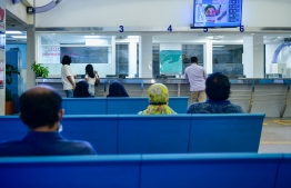 People at IGMH's reception counter -- Photo: Ahmed Avshan/Mihaaru