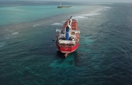 (FILE) Aerial shot of the bulk carrier Navio Amaryllis that had run aground in Rasfaree Reef in August: the bulk carrier has been granted permission to leave Maldives as it had paid the amount due in damages --Photo: Mohamed Shaahid