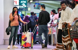 (FILE) Tourists in Velana International Airport on October 29, 2021: Maldives aims to attract 1.6 million tourists this year -- Photo: Fayaz Moosa/ Mihaaru