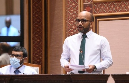 (FILE) Finance Minister Ibrahim Ameer presenting the proposed state budget for 2022 to the parliament on October 31, 2021: with the control of medicine prices it is estimated MVR 730 million can be savedfrom the Aasandha budget in 2022  -- Photo: Parliament