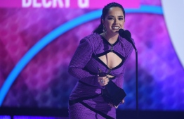 This handout photo courtesy of American Broadcasting Companies, Inc. / ABC shows US singer Becky G accept the Favorite Female Latin Artist award onstage during the 2021 American Music Awards at the Microsoft Theater on November 21, 2021 in Los Angeles. (Photo by American Broadcasting Companies, Inc. / ABC / AFP) / 
