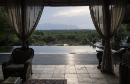 A general view of the Drakensberg mountains seen from the Khaya Ndlovu Manor House in Hoedspruit on December 1, 2021. - Snowbirds from the northern hemisphere normally flock to South Africa's austral summer. Before the pandemic, in 2019, tourism was 6.9 percent of South Africa's economy.  Photo: Wikus de Wet / AFP
