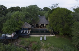This aerial view shows the Khaya Ndlovu Manor House in Hoedspruit on December 1, 2021. Snowbirds from the northern hemisphere normally flock to South Africa's austral summer. Before the pandemic, in 2019, tourism was 6.9 percent of South Africa's economy -- Photo:  Wikus de Wet / AFP