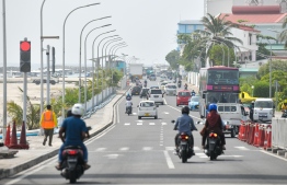 (FILE) Vehicles driving on Male' roads on December 21, 2021: the government did not disclose any information of the family that was repatriated to Maldives in order to protect their identity -- Photo: Fayaz Moosa / Mihaaru