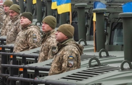 (FILE) Ukrainian servicemen prepare to celebrate Army Day in Kyiv, Ukraine, on December 6, 2021:  a cyberattack resulted in the websites of the Ministry of Foreign Affairs and a number of other government agencies in Ukraine to go down temporarily -- Photo: Gleb Garanich/Reuters