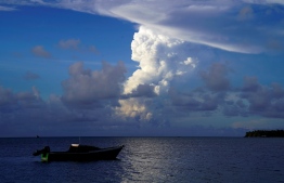 This picture taken on December 21, 2021 shows white gaseous clouds rising from the Hunga Ha'apai eruption seen from the Patangata coastline near Tongan capital Nuku'alofa. - A huge dust cloud spewed out when a volcano erupted in Tonga this week could result in showers of acid rain across the Pacific kingdom, emergency authorities have warned. -- Photo: Mary Lyn Fonua / AFP