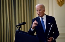 US President Joe Biden answers questions after speaking about the status of the country’s fight against Covid-19 and the Omicron variant, in the State Dining Room of the White House in Washington, DC, on December 21, 2021-- Photo: /BrendanSmialowski / AFP