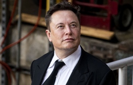(FILE) Elon Musk, chief executive officer of Tesla Inc., departs from court for the SolarCity trial in Wilmington, Delaware, U.S., on Monday, July 12, 2021.  -- Photographer: Al Drago/Bloomberg via Getty Images