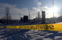 Police tape closes off access to a home destroyed by the Marshall Fire in the Rock Creek neighborhood in the town of Superior in Boulder County, Colorado on January 1, 2022. -- Photo: Jason Connolly / AFP