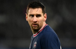 (FILES) This file photo taken on December 7, 2021 shows Paris Saint-Germain's Argentinian forward Lionel Messi at the Parc des Princes stadium in Paris on December 7, 2021. - Lionel Messi has tested positive for Covid-19 and has entered self-isolation, his club Paris Saint-Germain announced on January 2, 2022. -- Photo: Franck Fife / AFP