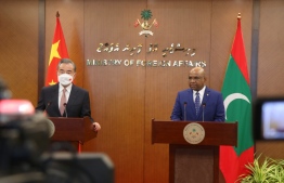 China's former Foreign Minister Wang YI (Left) and Maldives Foreign Minister Abdulla Shahid (Right): The visa-free agreement signed between the two countries has now come into force -- Photo: Ministry of Foreign Affairs