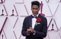(FILES) In this file photo taken on April 25, 2021 musician Jon Batiste, co-nominated for an Academy Award for Original Score for "Soul" arrives at the Oscars at Union Station in Los Angeles. - The Grammy music awards will be held in Las Vegas for the first time this April after being postponed because of the surge of Omicron-variant Covid-19 cases across the United States.
the United States. -- Photo: Chris Pizzello / POOL / AFP